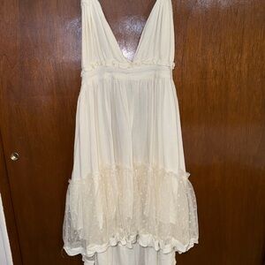 Elegant Cream Sleeveless Dress